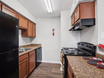 Refrigerator, dishwasher, garbage disposal, and oven